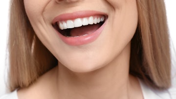 Womans mouth showing contoured teeth