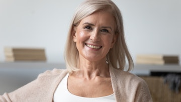 Older woman smiling showing teeth