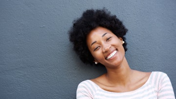 Woman showing off great teeth smiling