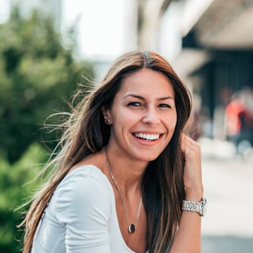 Woman smiling showing white teeth