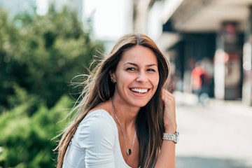 Woman smiling showing white teeth